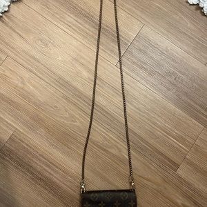 Louis Vuitton chained wallet